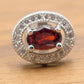 Sterling Silver Oval Red Ruby CZ Halo Stud Earrings, 0.40 Inch, Simulated Gemstone