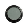 Round eyeshadow compact with black rim on a white background